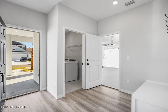 a view of an empty room and window