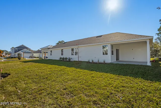 a front view of house with yard