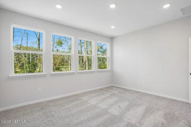 an empty room with windows