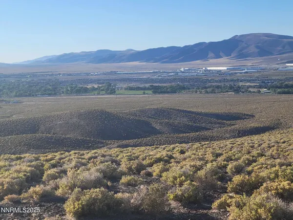 a view of an outdoor space and mountain view