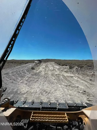 a view of roof with sitting area