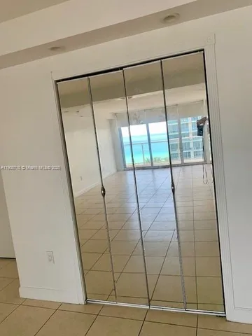 a bathroom with a shower and a bathtub