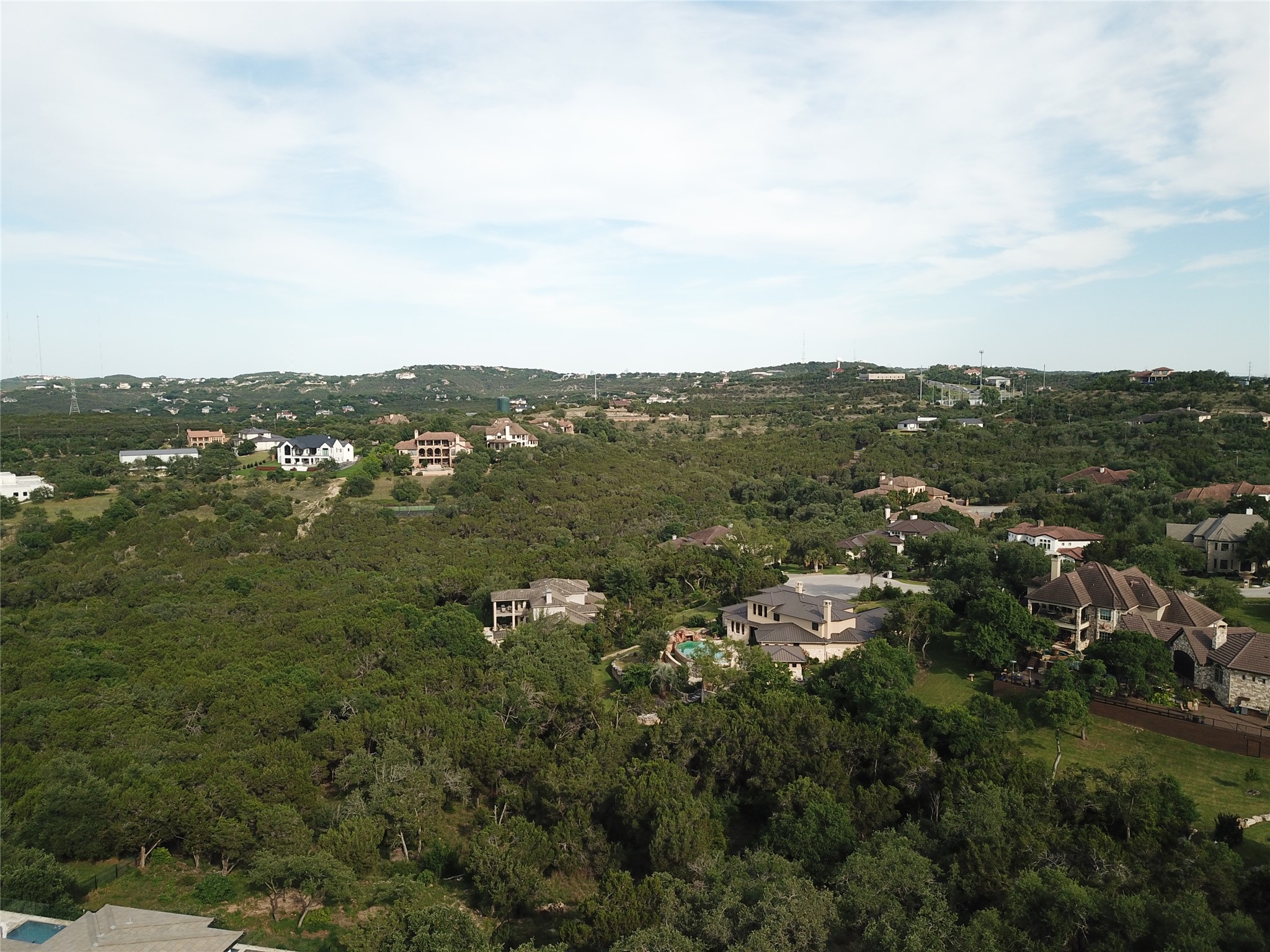 117 Brandon Way Austin, TX 78733 - Photo 13 of 13 an aerial view of residential houses with outdoor space and trees