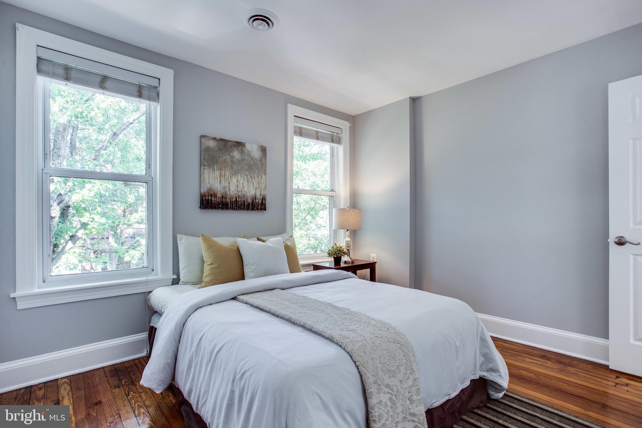 241 Warren Street Northeast Washington, DC 20002 - Photo 17 of 43 Bright front bedroom has 2 windows