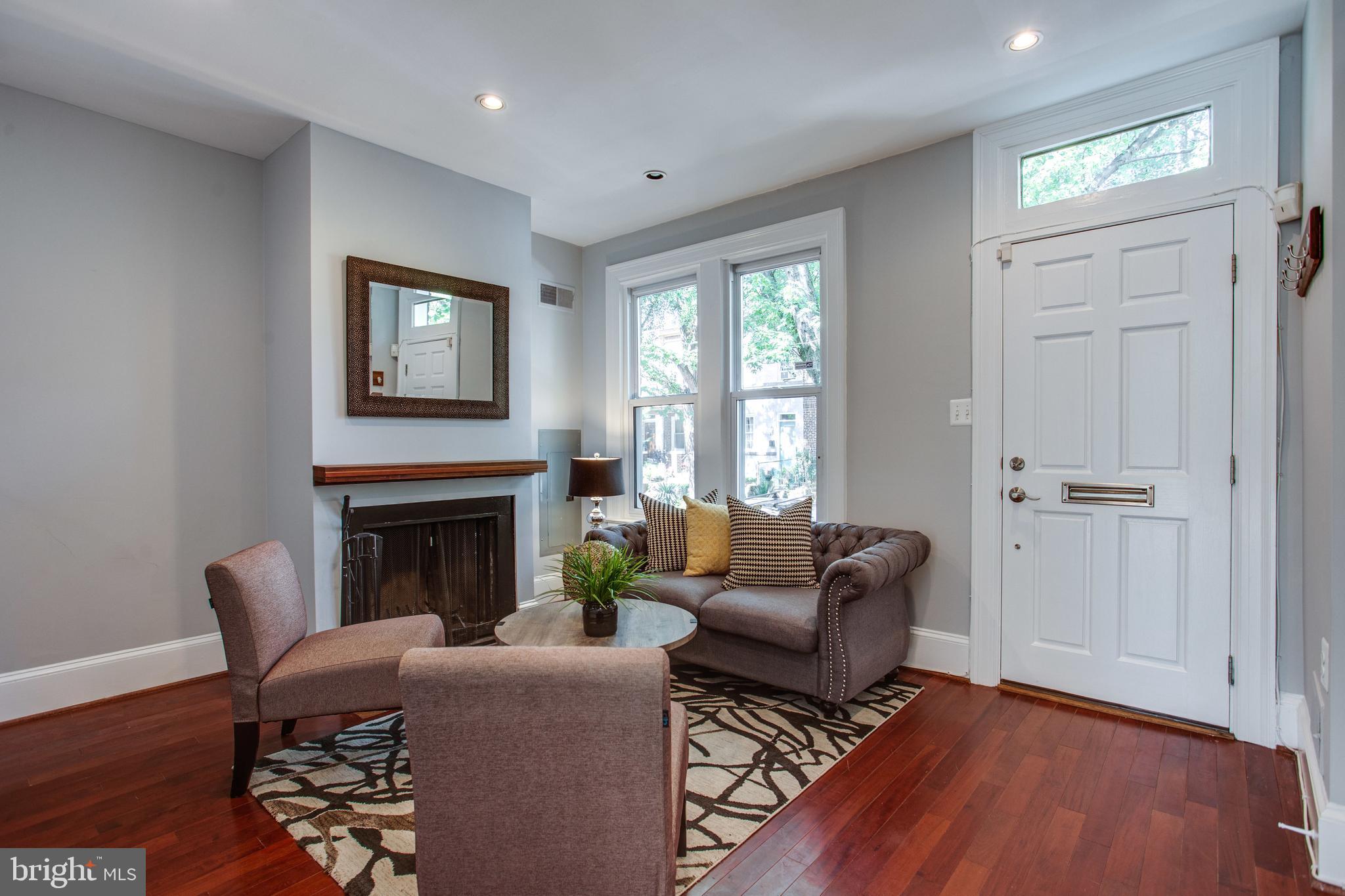241 Warren Street Northeast Washington, DC 20002 - Photo 5 of 43 Gleaming wood floors, two windows