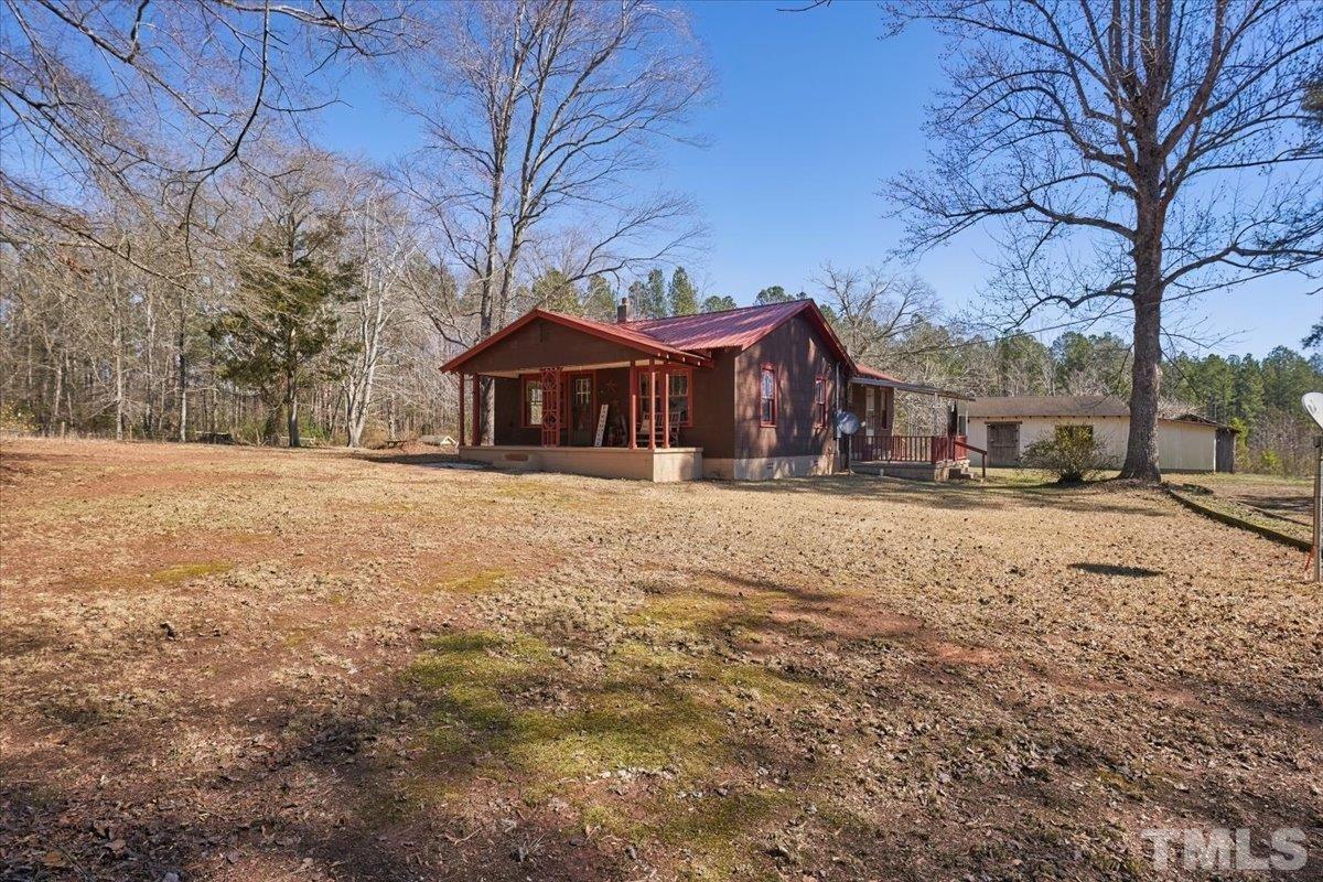 1899 Jason Road Seagrove, NC 27341 - Photo 1 of 51 a front view of a house with a yard