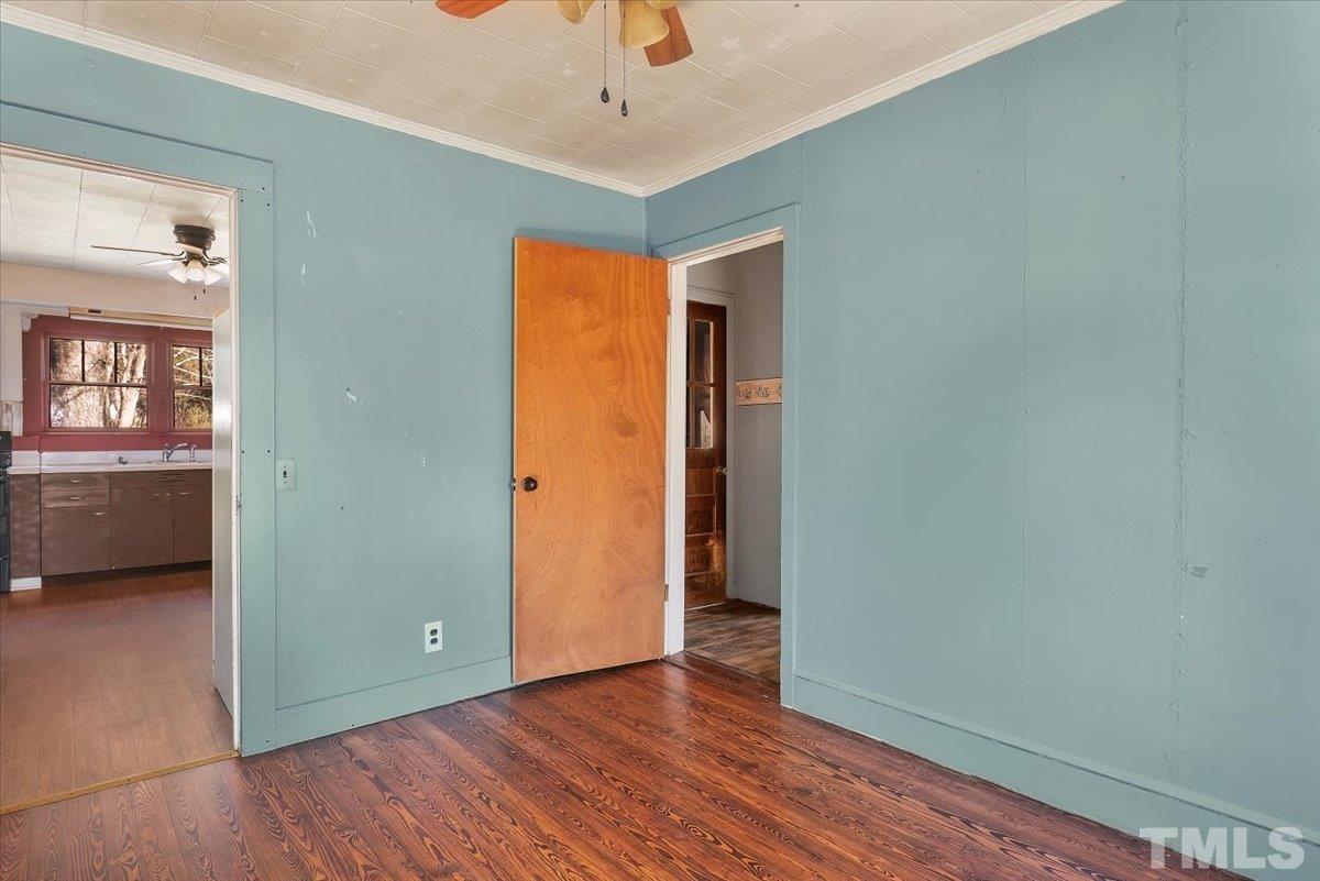 1899 Jason Road Seagrove, NC 27341 - Photo 20 of 51 wooden floor in an empty room and a window