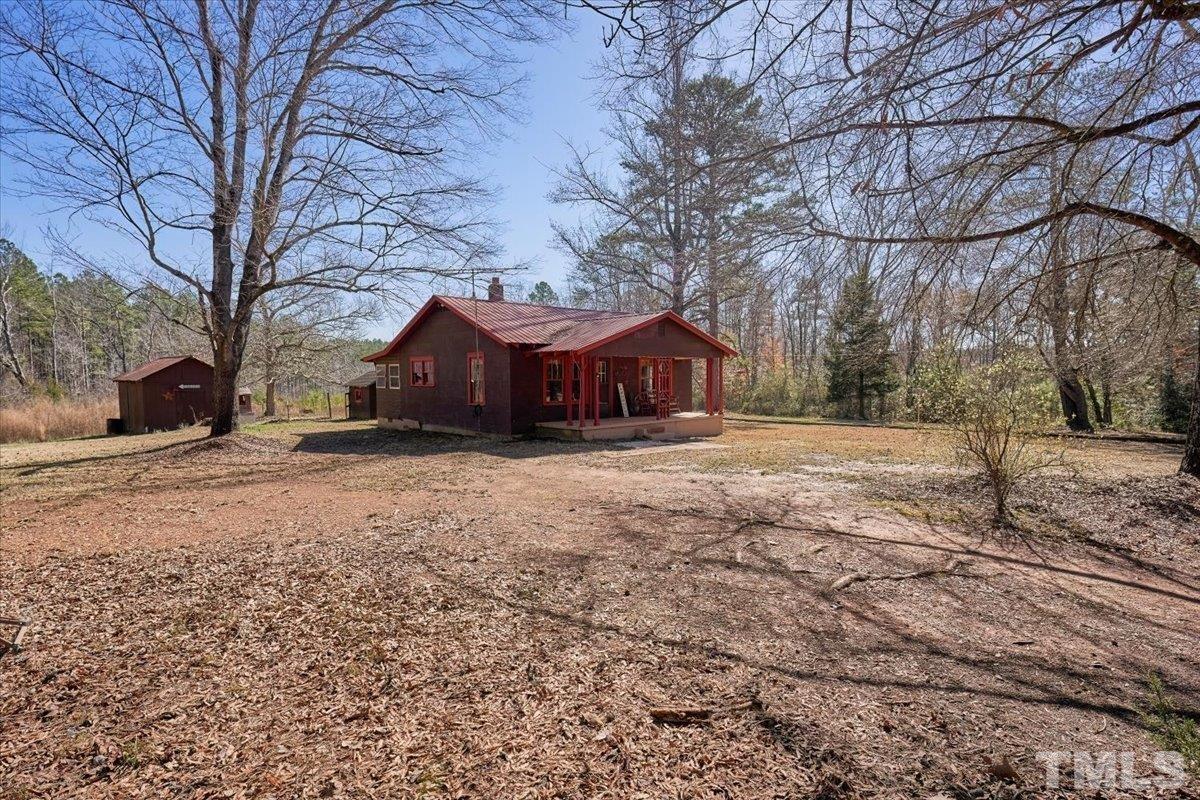 1899 Jason Road Seagrove, NC 27341 - Photo 46 of 51 a house view with a yard covered with snow in front of house