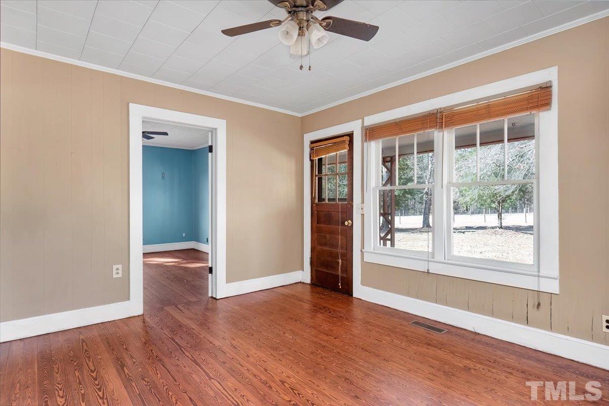 1899 Jason Road Seagrove, NC 27341 - Photo 9 of 51 a view of an empty room with window and wooden floor