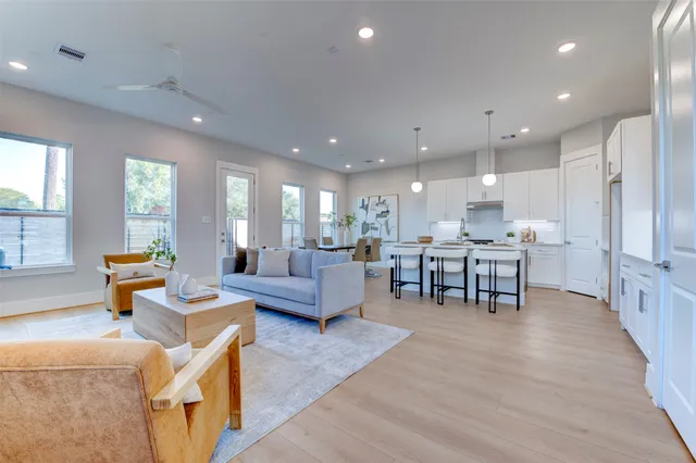 a living room with furniture and a table