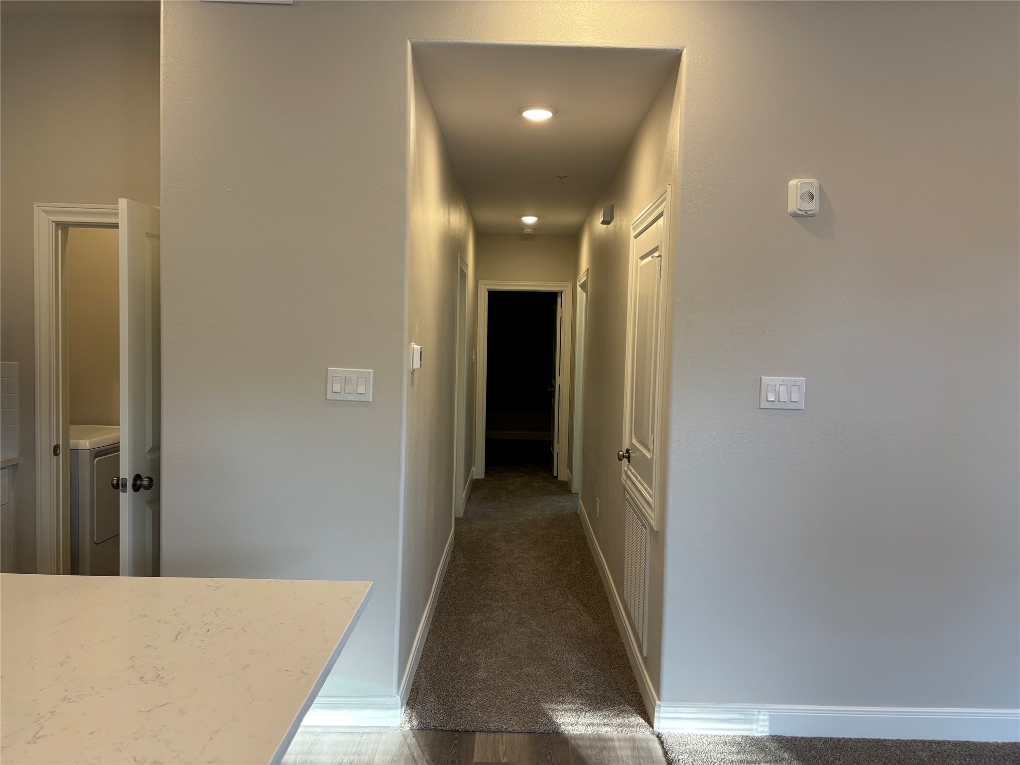 504 Nursery Road, Unit 1108 The Woodlands, TX 77380 - Photo 7 of 25 a view of a hallway to an empty room and closet
