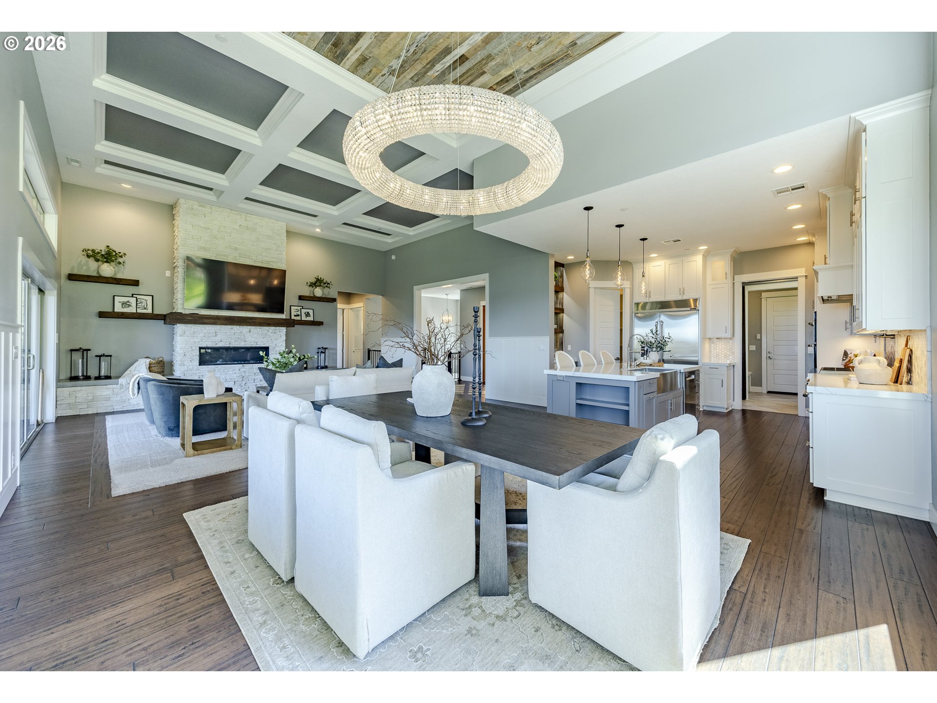 4048 Eagle View Drive Eugene, OR 97405 - Photo 12 of 48 a living room with stainless steel appliances kitchen island granite countertop a table and chairs in it