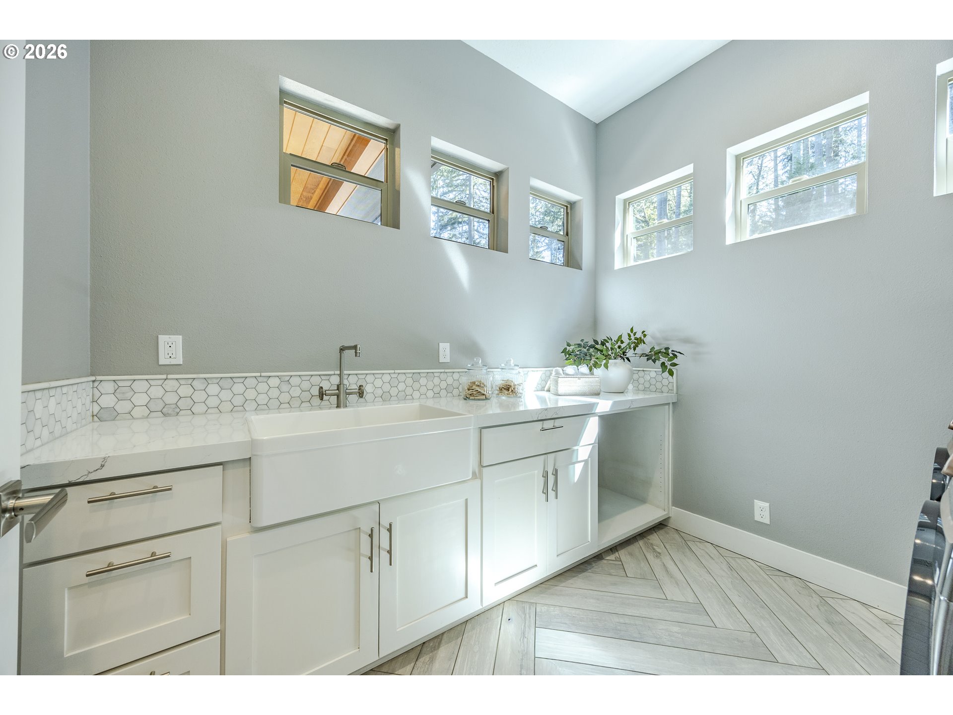 4048 Eagle View Drive Eugene, OR 97405 - Photo 19 of 48 a bathroom with a sink and a mirror
