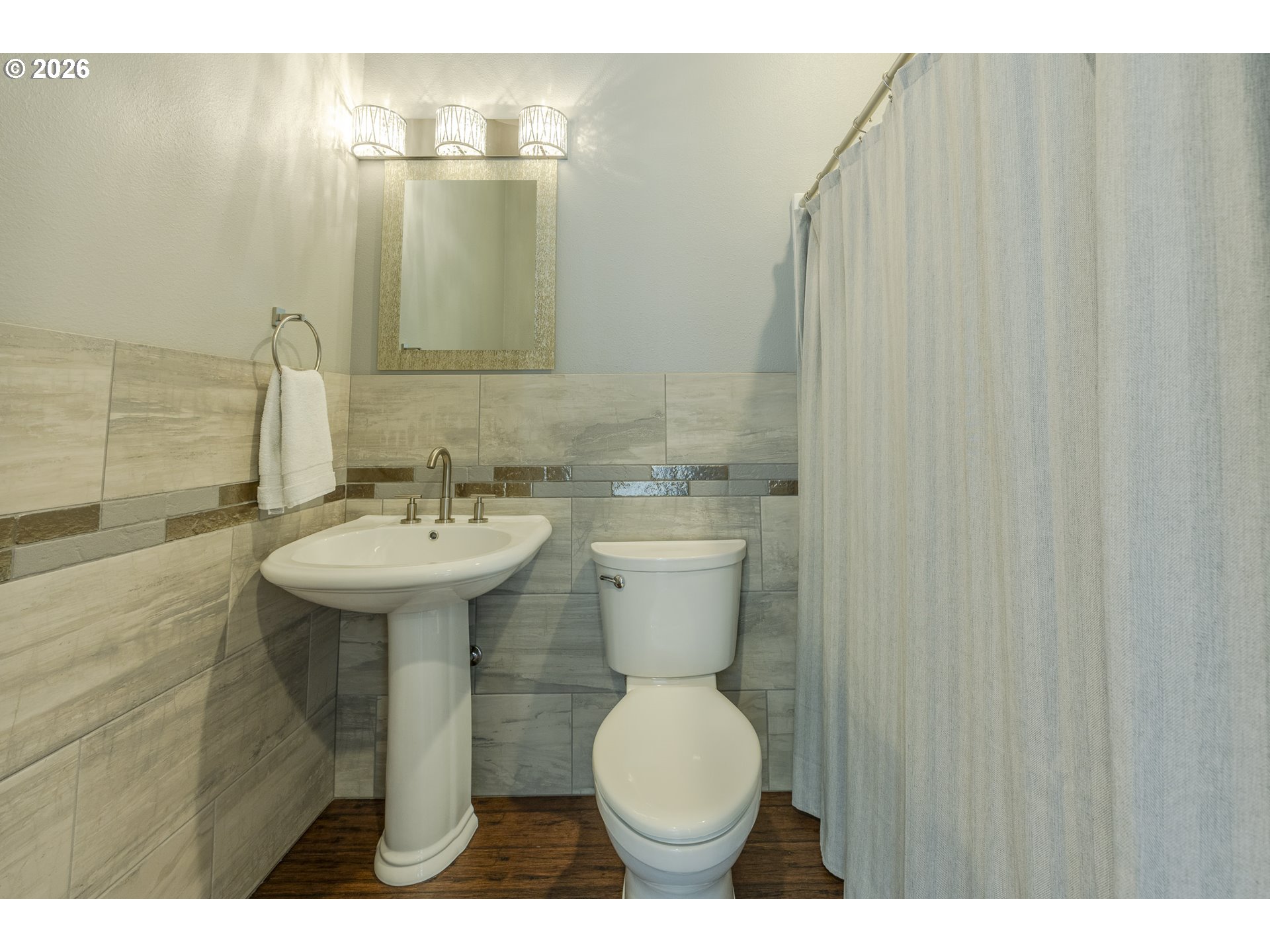 4048 Eagle View Drive Eugene, OR 97405 - Photo 21 of 48 a bathroom with a sink toilet and mirror