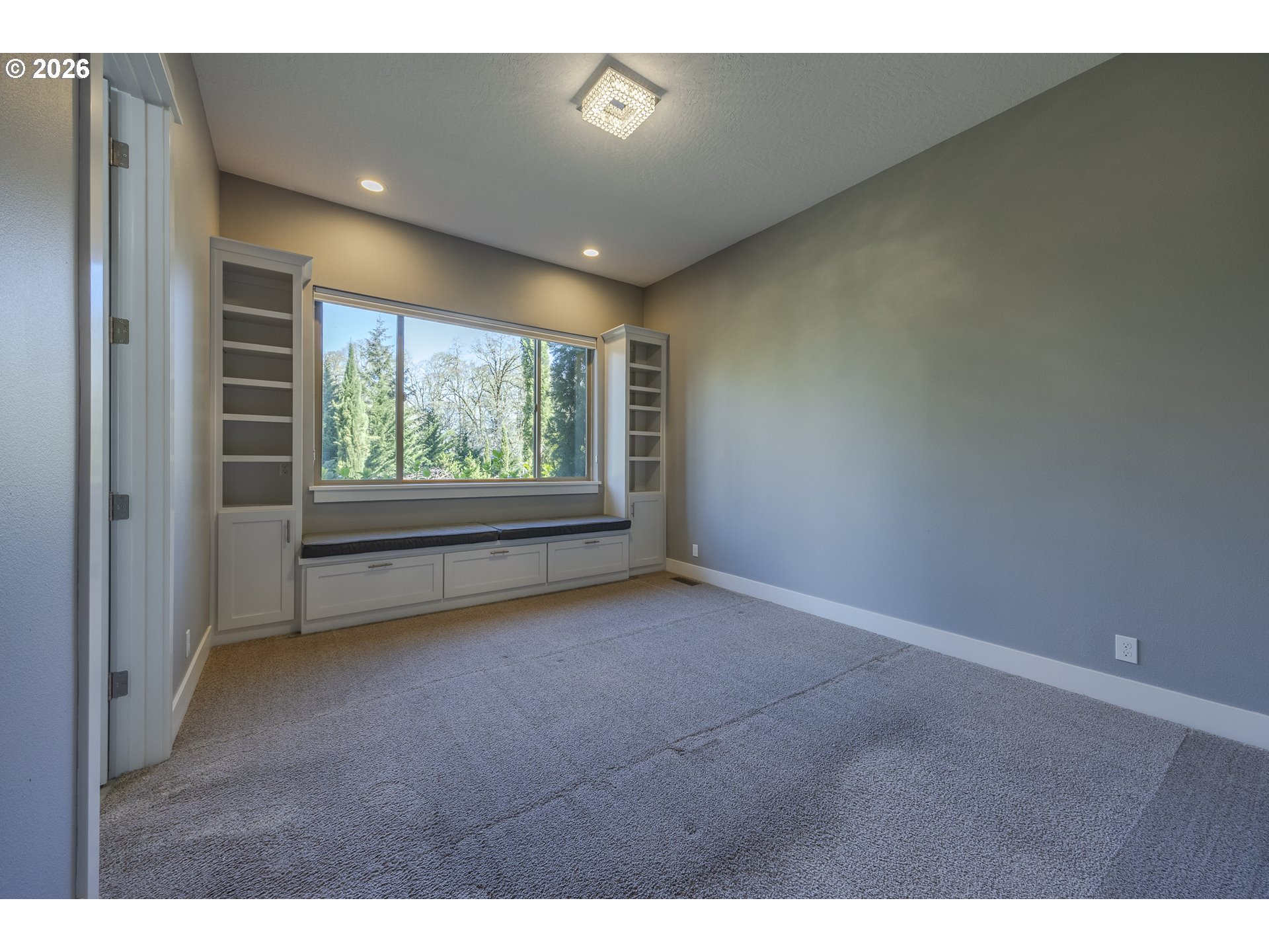 4048 Eagle View Drive Eugene, OR 97405 - Photo 35 of 48 a view of an empty room with a window