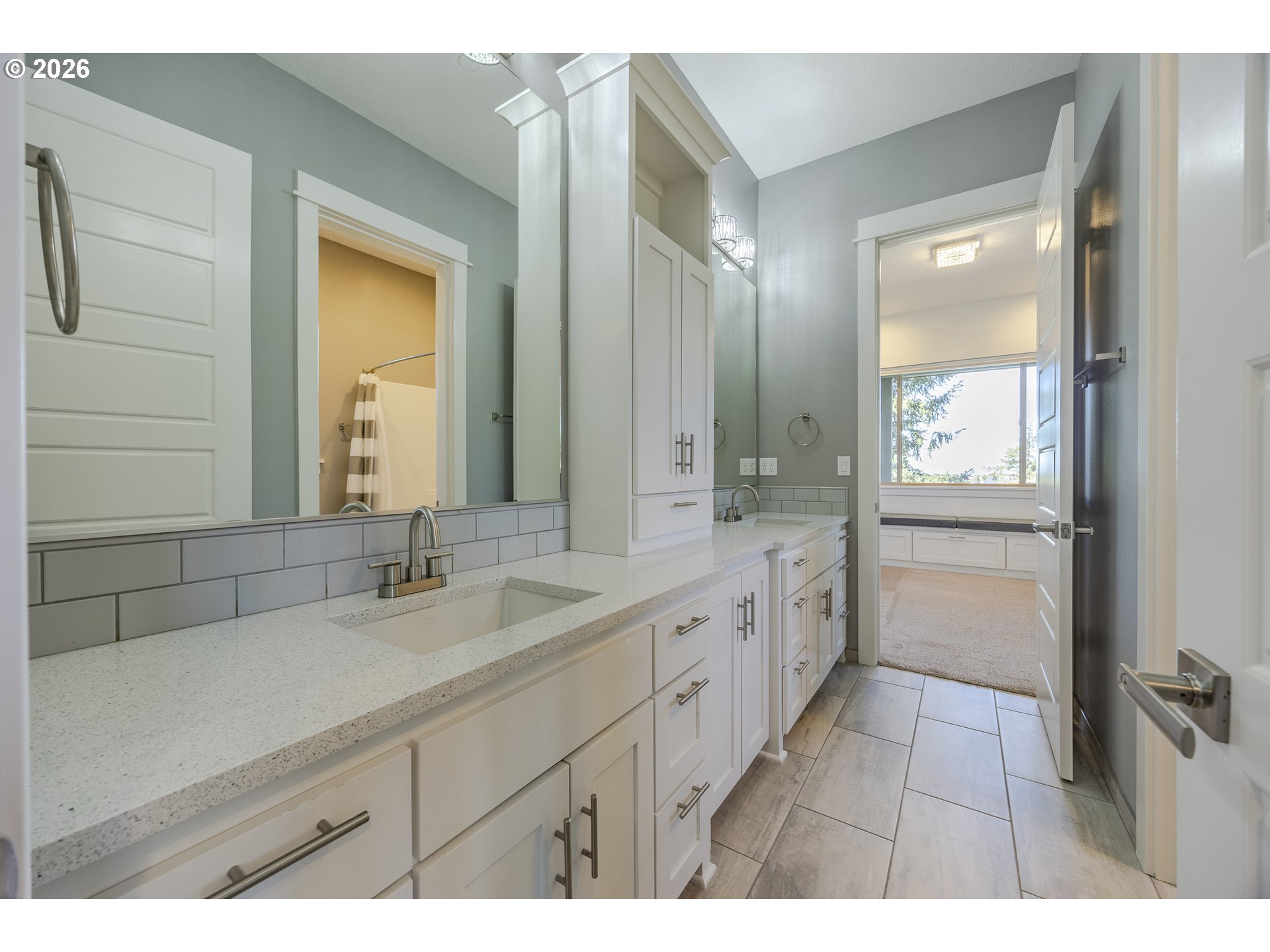 4048 Eagle View Drive Eugene, OR 97405 - Photo 36 of 48 a spacious bathroom with a double vanity sink a mirror and a shower