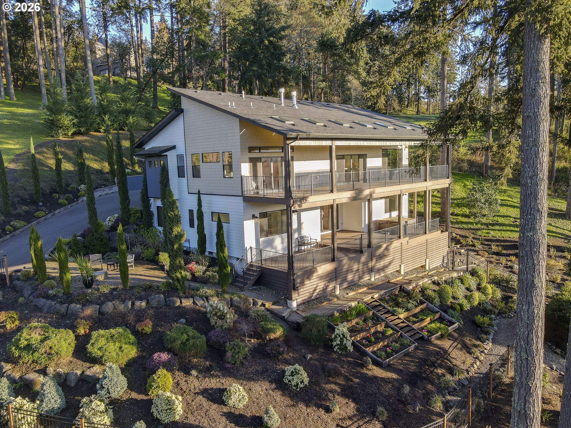 4048 Eagle View Drive Eugene, OR 97405 - Photo 45 of 48 a aerial view of a house with a yard and garden