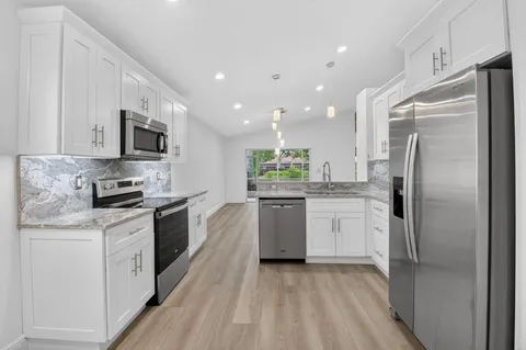 $566,000 | 5891 Royal Isles Boulevard, Boynton Beach, FL 33437