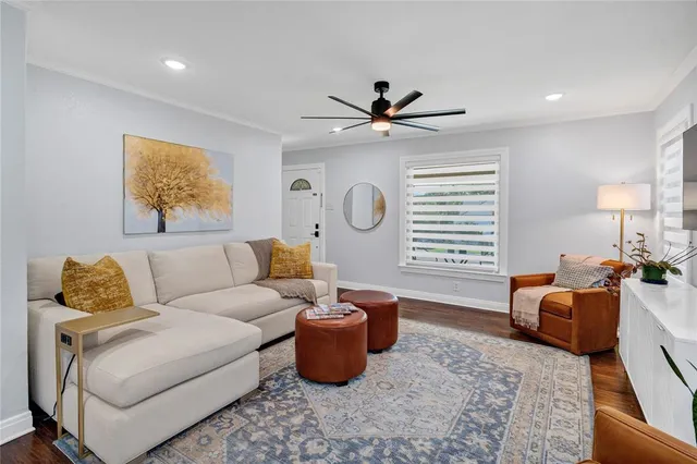 a living room with furniture and a window