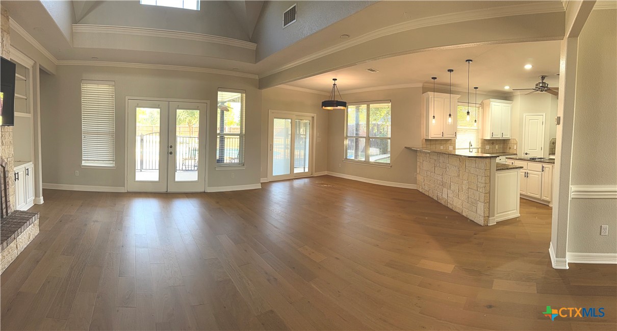 1084 Frederick Lane Temple, TX 76502 - Photo 13 of 40 a view of an entryway with wooden floor