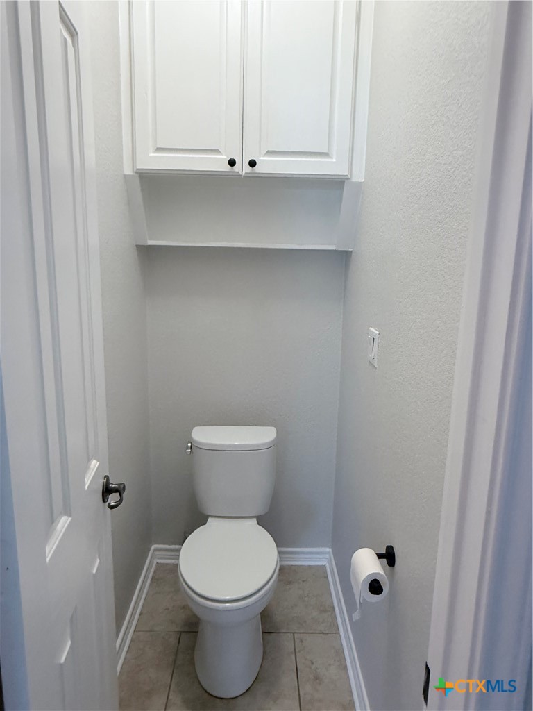 1084 Frederick Lane Temple, TX 76502 - Photo 23 of 40 a bathroom with a toilet and a sink