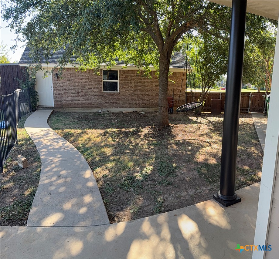 1084 Frederick Lane Temple, TX 76502 - Photo 39 of 40 a view of a yard with large tree
