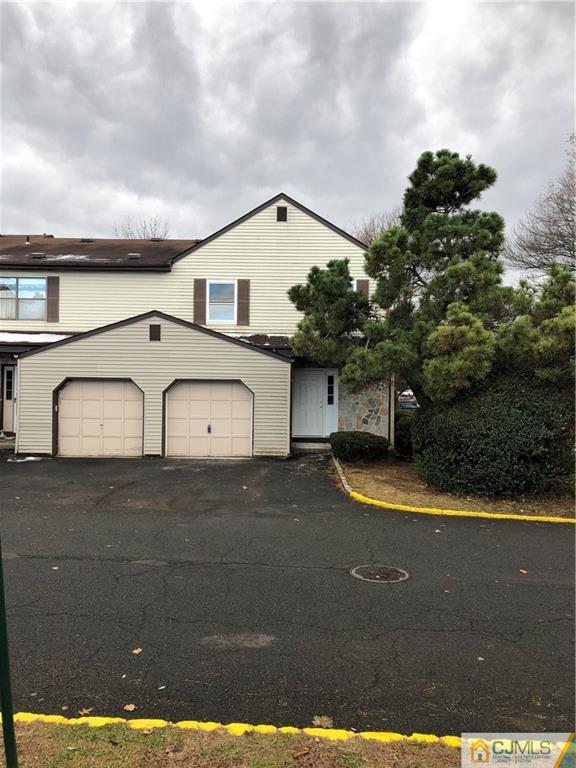 3008 Hana Road Edison, NJ 08817 - Photo 1 of 24 a front view of a house with garden