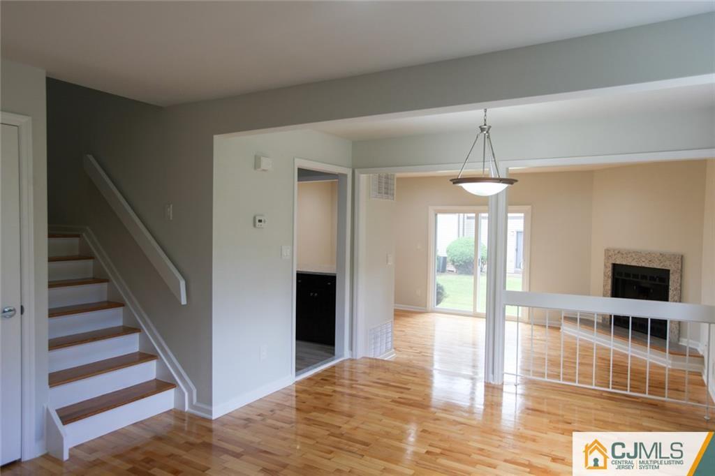 3008 Hana Road Edison, NJ 08817 - Photo 14 of 24 a view of a livingroom with an empty space and a window