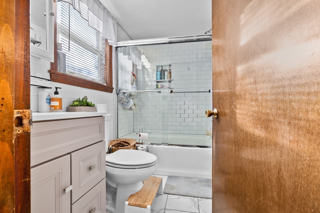 65 Poplar Street Gloucester, MA 01930 - Photo 13 of 23 a bathroom with a toilet sink and shower