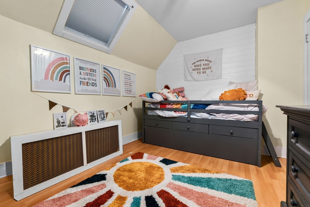 65 Poplar Street Gloucester, MA 01930 - Photo 14 of 23 a kitchen with a stove and a refrigerator