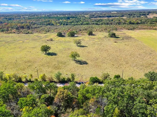 a view of an ocean and mountain