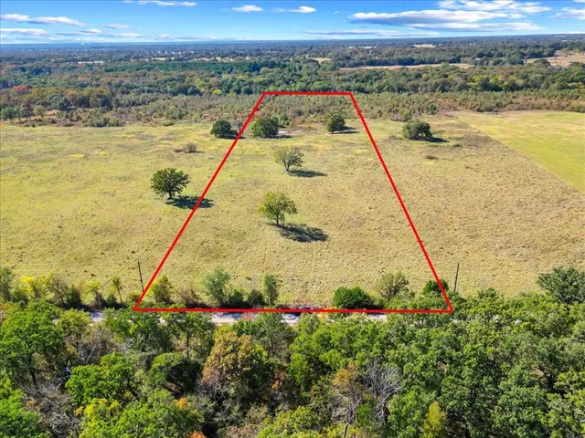 a view of a swimming pool with a lake and mountain view
