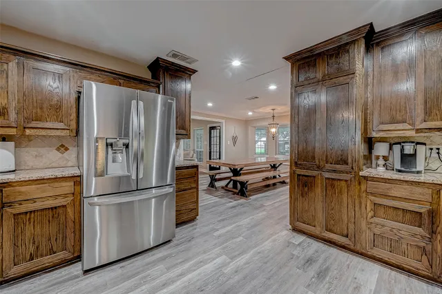a living room with furniture a air conditioner and window