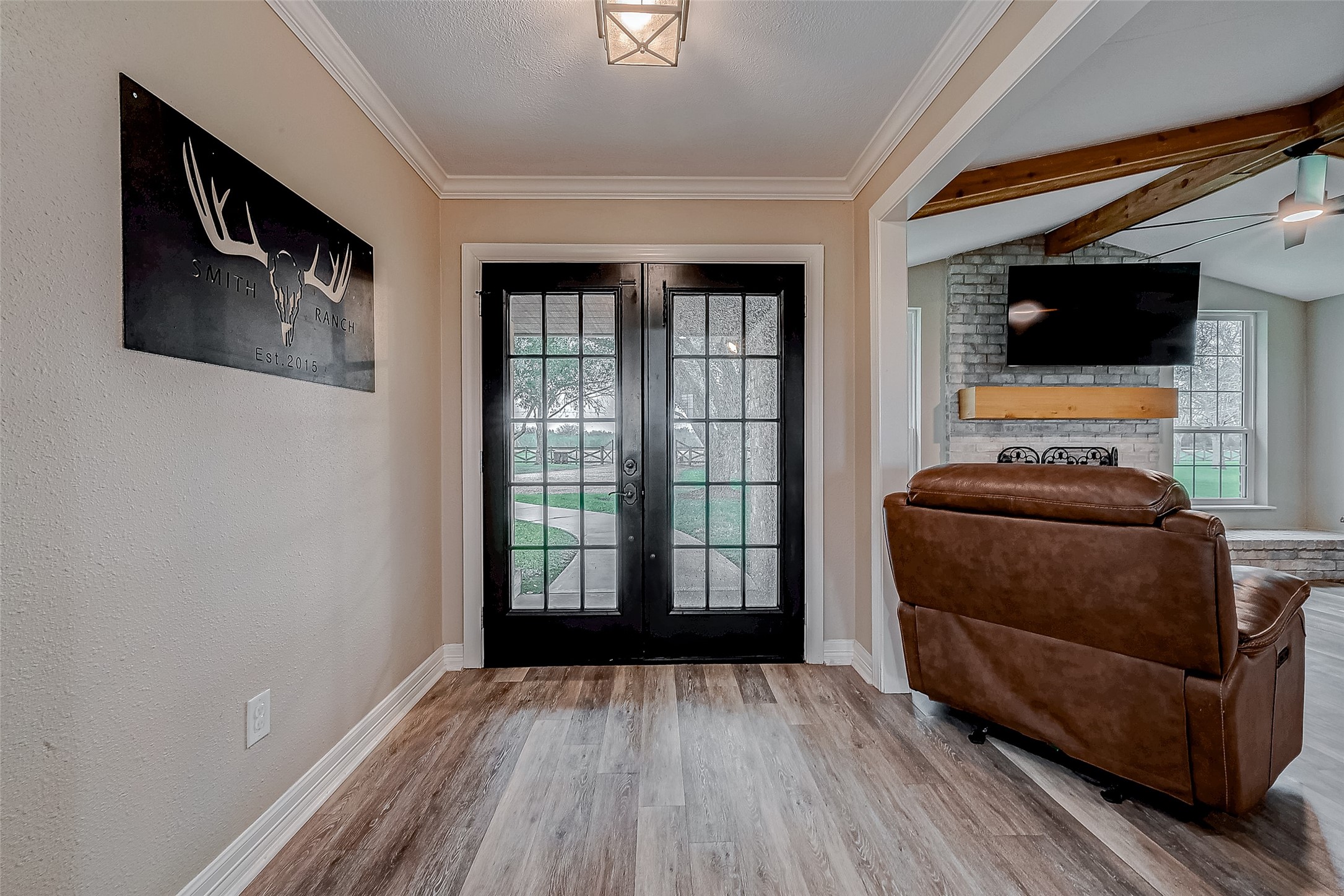 3819 Cottonwood School Road Rosenberg, TX 77471 - Photo 6 of 37 a living room with furniture and a flat screen tv