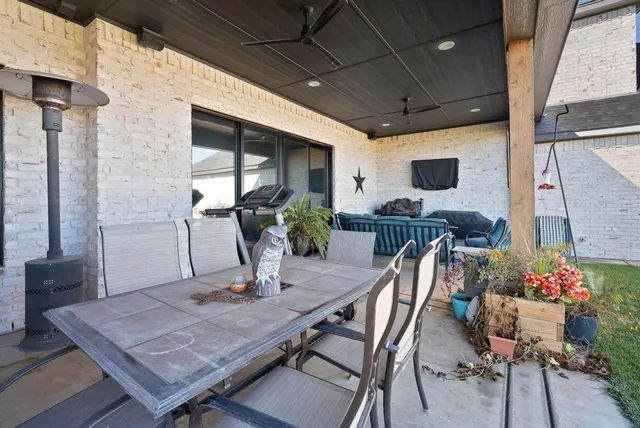 a front view of house with yard and seating space