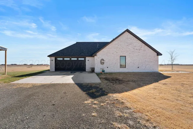 a view of a house with patio
