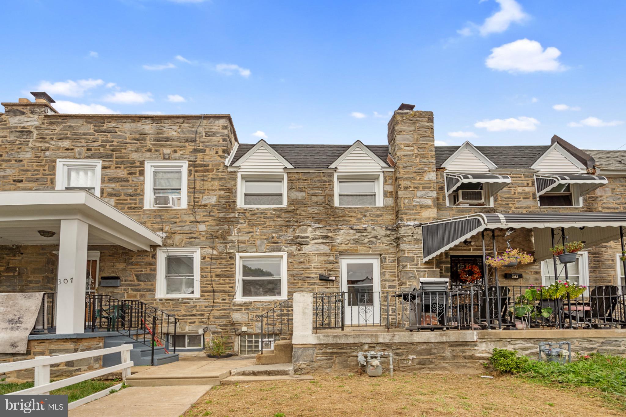 305 Margate Road Upper Darby, PA 19082 - Photo 1 of 20 front view of a building with a fountain