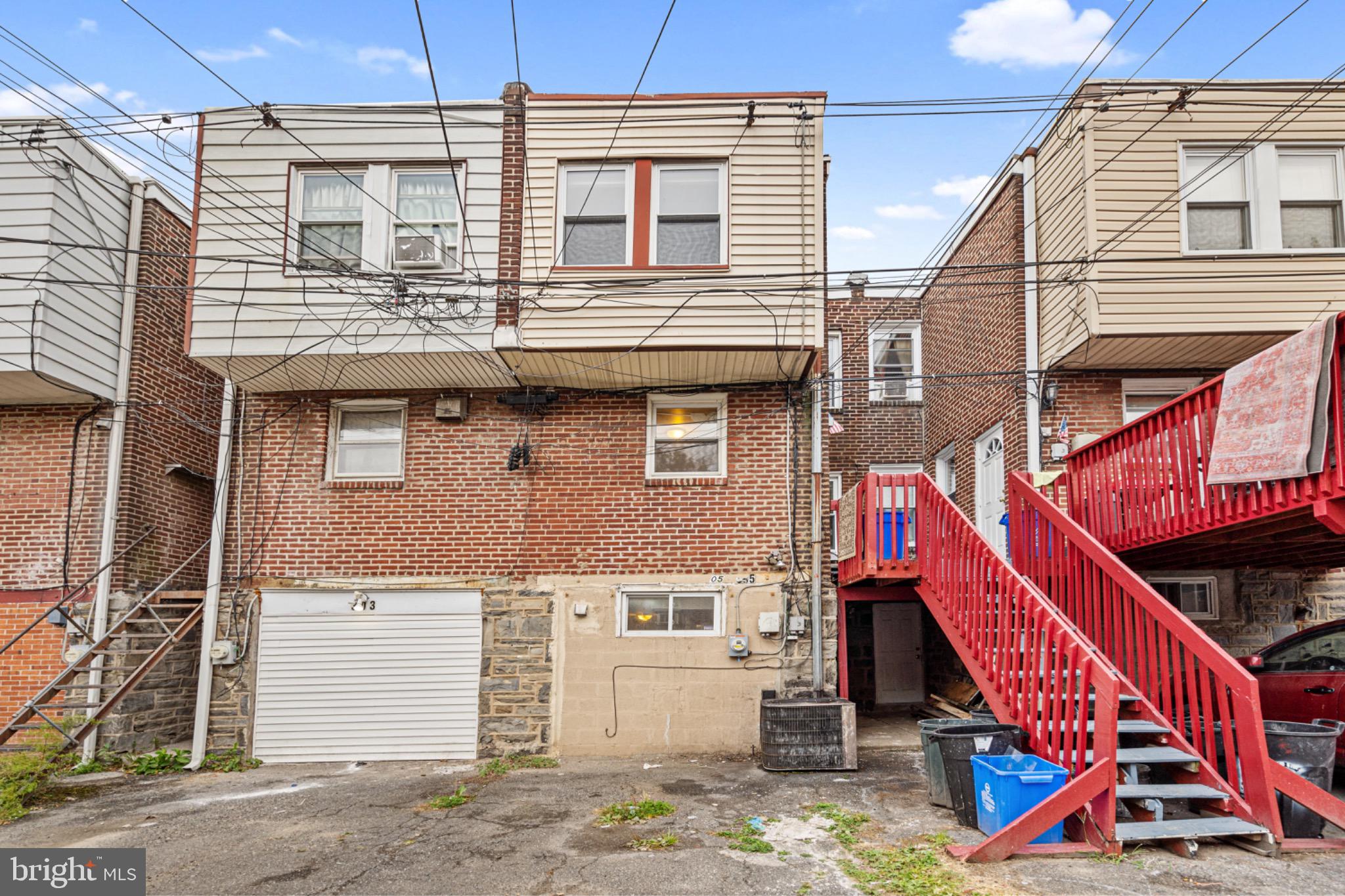 305 Margate Road Upper Darby, PA 19082 - Photo 16 of 20 a view of a house with a yard