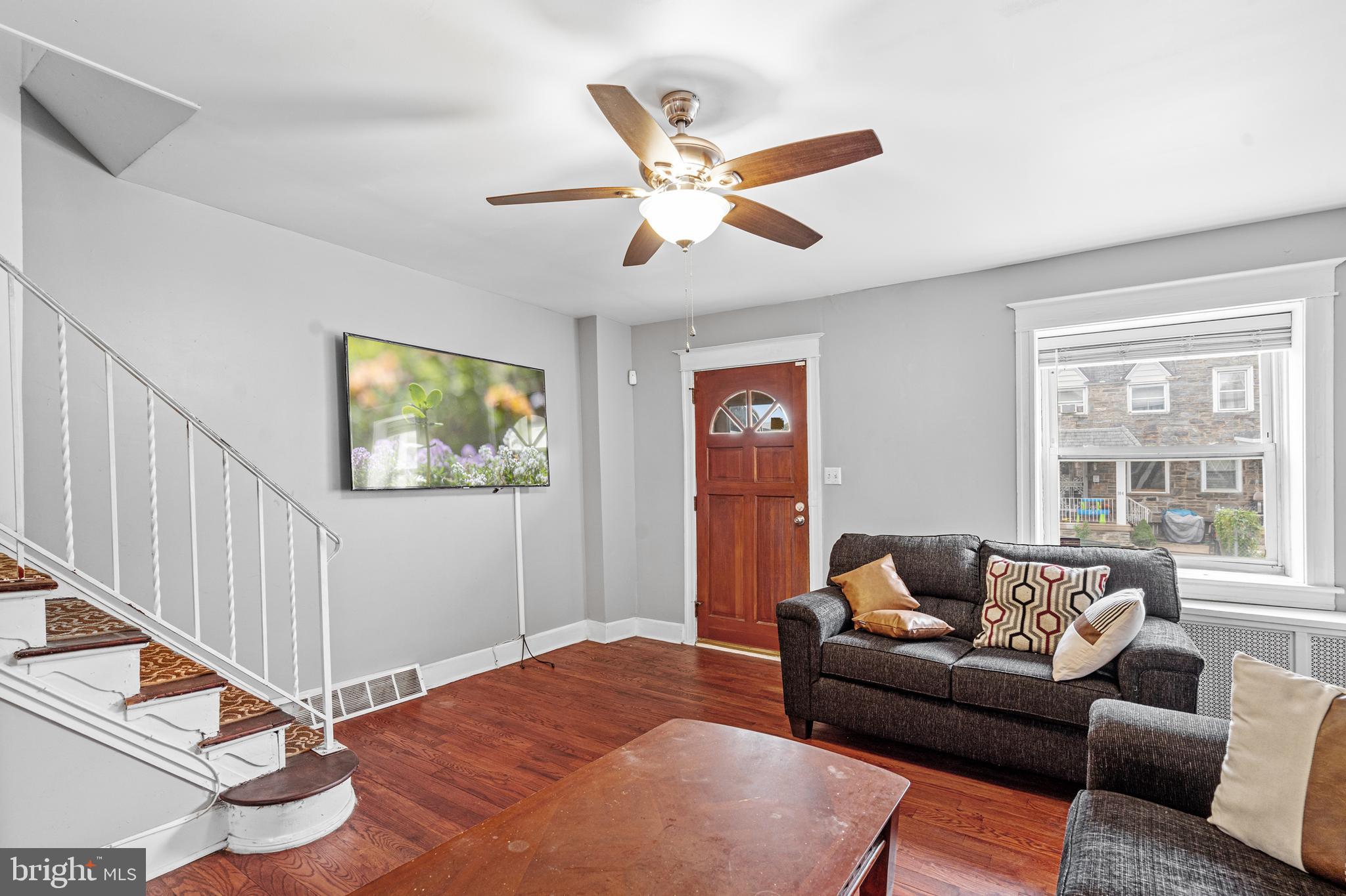 305 Margate Road Upper Darby, PA 19082 - Photo 2 of 20 a living room with furniture and a window