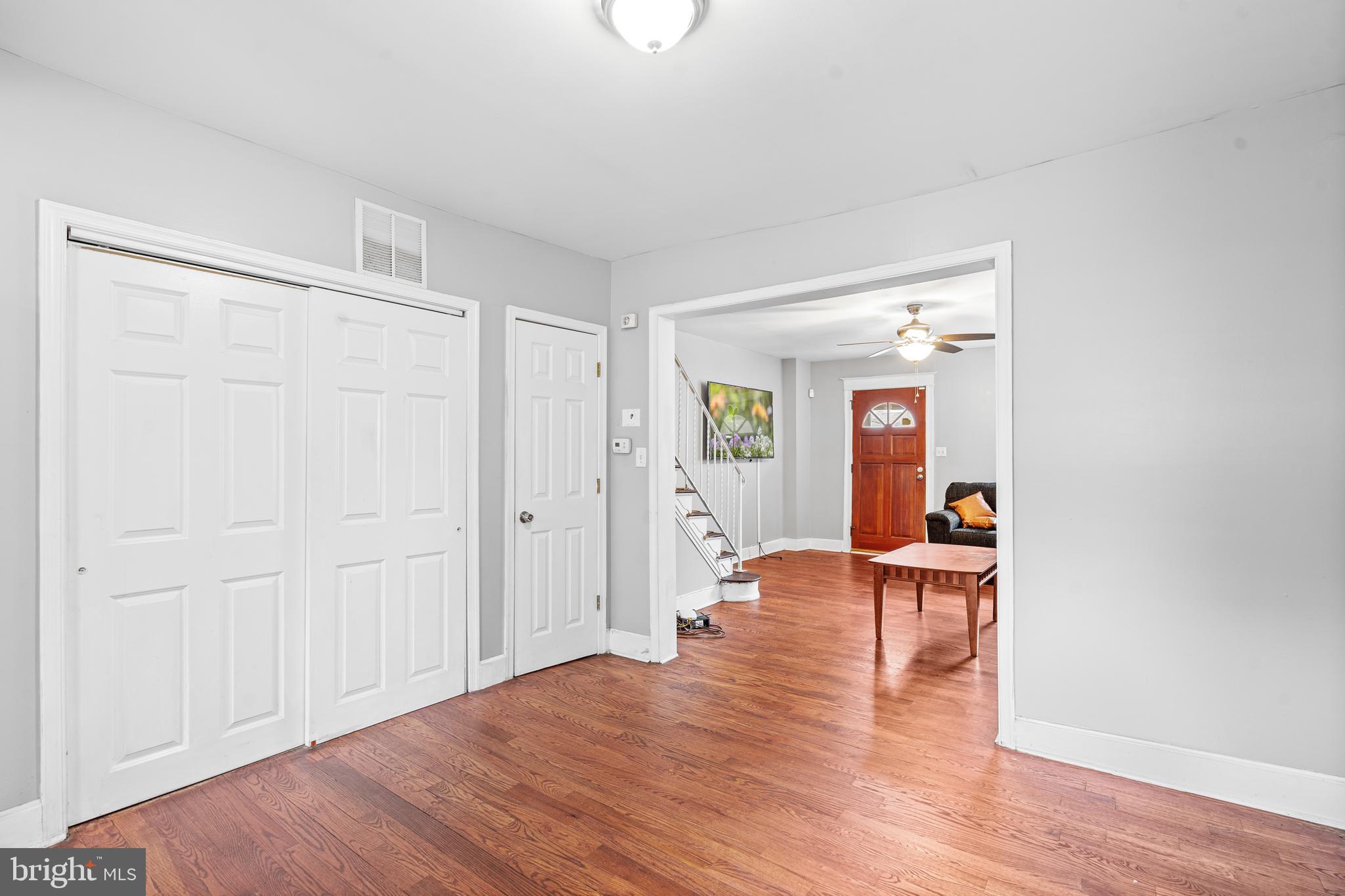 305 Margate Road Upper Darby, PA 19082 - Photo 5 of 20 a view of a room with wooden floor lounge chair and windows