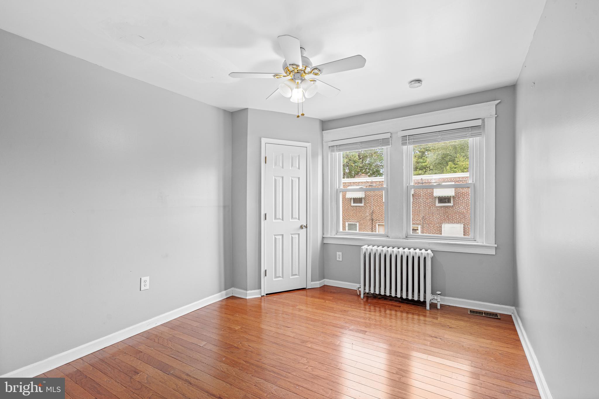 305 Margate Road Upper Darby, PA 19082 - Photo 7 of 20 a view of an empty room with a window