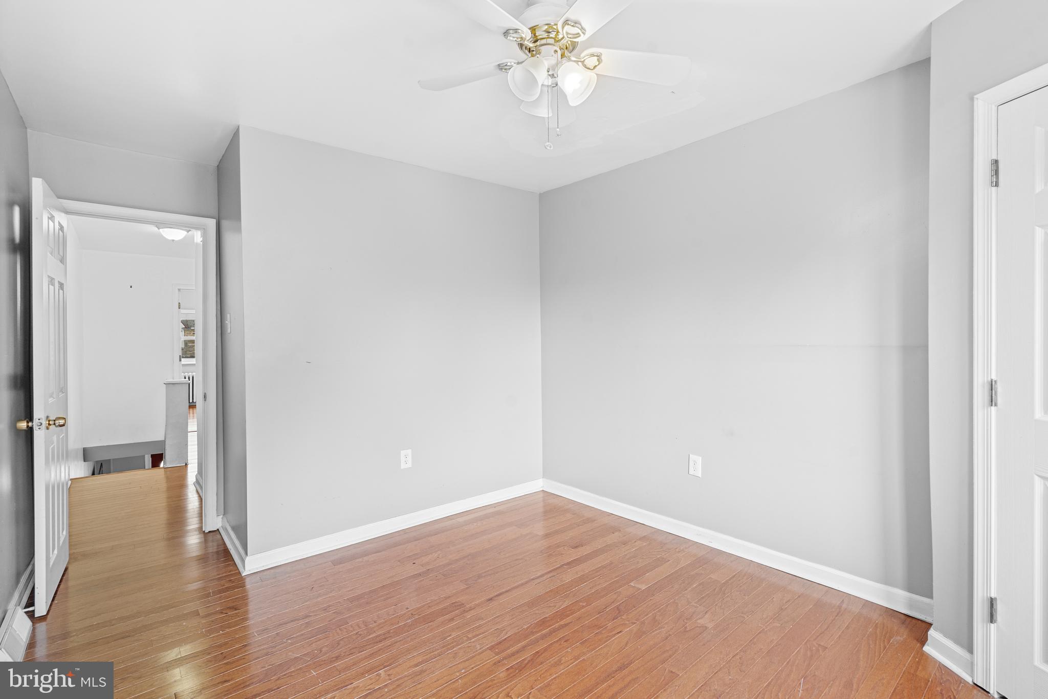 305 Margate Road Upper Darby, PA 19082 - Photo 8 of 20 a view of an empty room with wooden floor