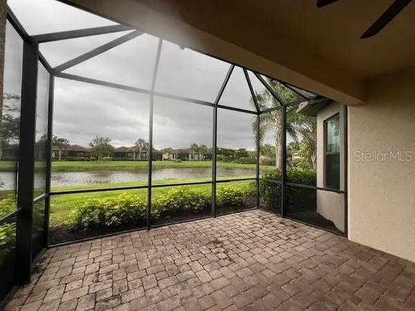 a view of a pathway with a yard