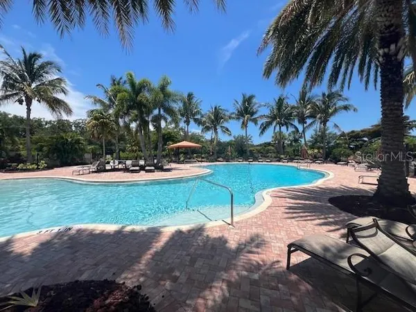 a view of a yard with a patio