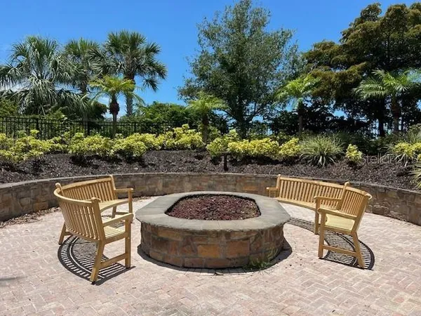 a view of a swimming pool with a lounge chairs
