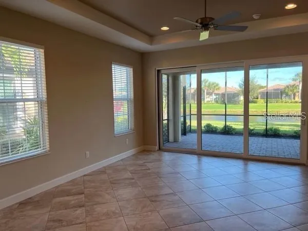 a view of an empty room with a sliding door
