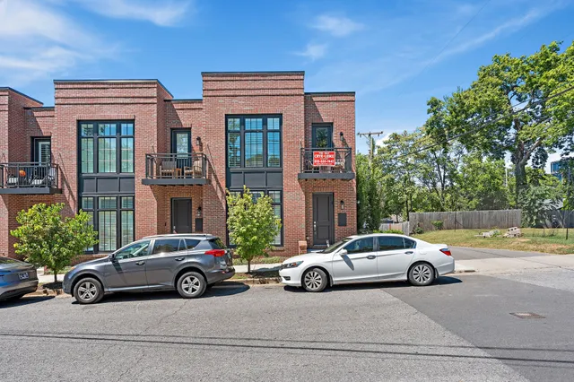 a car parked in front of a house