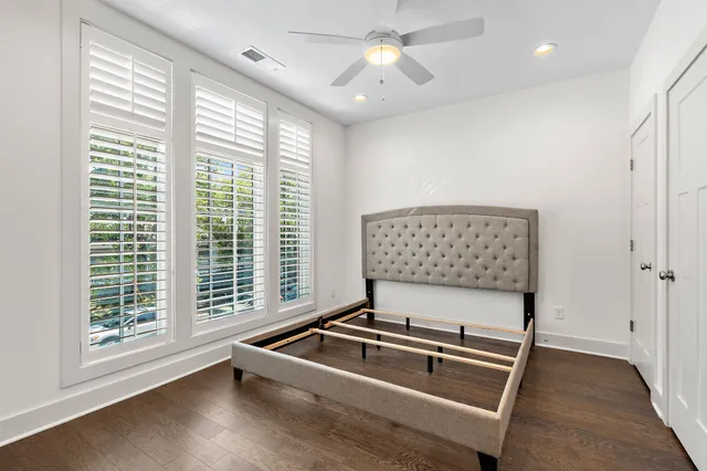 a room with gym equipment and a large window