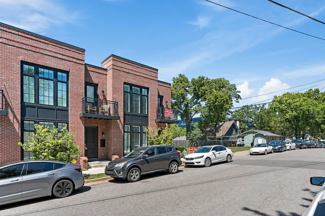 a car parked in front of a house