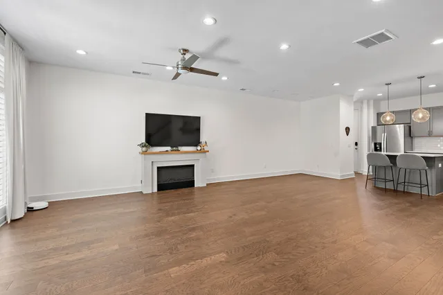a view of kitchen with furniture and flat screen tv